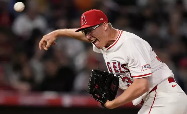 Los Angeles Angels relief pitcher Ryan Johnson throws to the plate during the seventh inning of a baseball game against the Detroit Tigers, Friday, May 2, 2025, in Anaheim, Calif. (AP Photo/Mark J. Terrill)