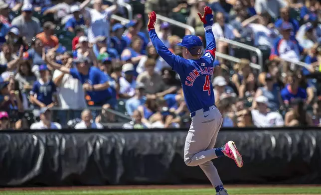 Chicago Cubs outfielder Pete Crow-Armstrong (4) celebrates making a home run during the sixth inning of the baseball game against the New York Mets, Sunday, May 11, 2025, in New York. (AP Photo/Angelina Katsanis)