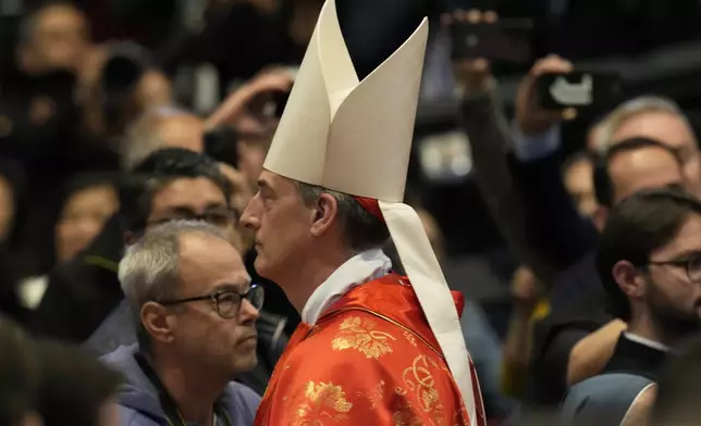 Cardinal François-Xavier Bustillo attends a final Mass celebrated by cardinals inside St. Peter's Basilica, before the conclave to elect a new pope, at the Vatican, Wednesday, May 7, 2025. (AP Photo/Gregorio Borgia)