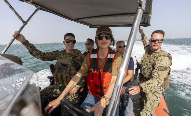 Homeland Security Secretary Kristi Noem, center, pilots an Over the Horizon Small Boat, Mark 4, at Naval Support Activity, Manama, Bahrain, Sunday, May 25, 2025. (AP Photo/Alex Brandon, Pool)
