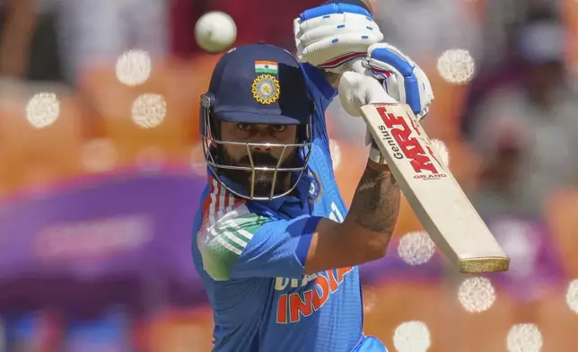 FILE - India's Virat Kohli plays a shot during the third one day international cricket match between India and England in Ahmedabad , India, on Feb. 12, 2025. (AP Photo/ Ajit Solanki, File)