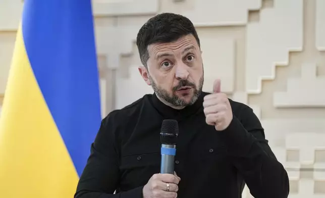 Ukrainian President Volodymyr Zelenskyy talks to journalists at the Ukrainian Embassy in Ankara, Turkey, Thursday, May 15, 2025. (AP Photo/Evgeniy Maloletka)