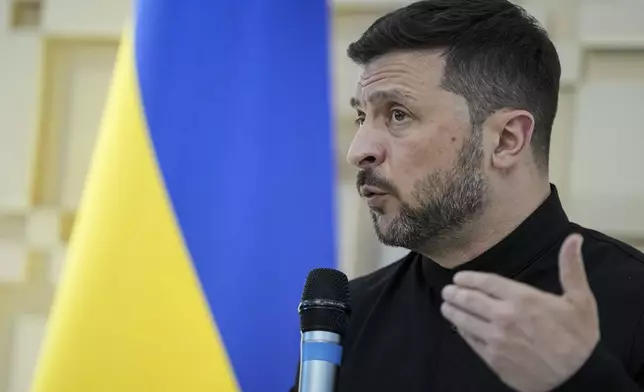 Ukrainian President Volodymyr Zelenskyy talks to journalists at the Ukrainian Embassy in Ankara, Turkey, Thursday, May 15, 2025. (AP Photo/Evgeniy Maloletka)