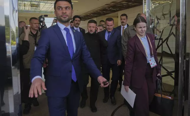 Ukrainian President Volodymyr Zelenskyy, center, leaves upon his arrival at Esenboga airport in Ankara, Turkey, Thursday, May 15, 2025. (AP Photo/Evgeniy Maloletka)