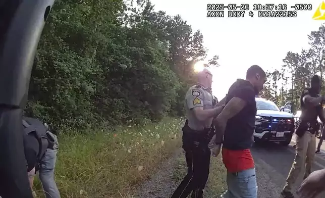 This image from video taken by Huntsville Police Department on May 26, 2025, shows the arrest of two New Orleans inmates who were on the run since their May 16, 2025, jailbreak. (Huntsville Police Department via AP)