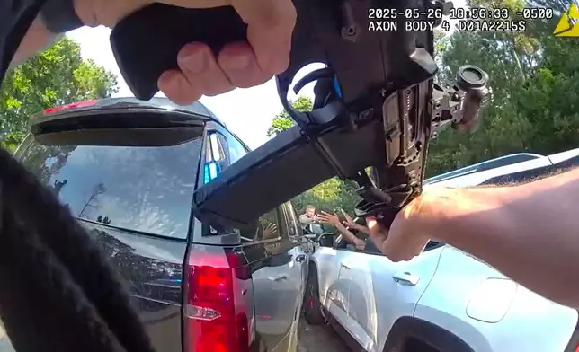 This image from video taken by Huntsville Police Department on May 26, 2025, shows the arrest of two New Orleans inmates who were on the run since their May 16, 2025, jailbreak. (Huntsville Police Department via AP)