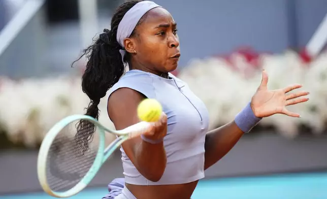 United States' Coco Gauff returns to Aryna Sabalenka of Belarus during the Madrid Open tennis final in Madrid, Spain, Saturday, May 3, 2025. (AP Photo/Jose Breton)