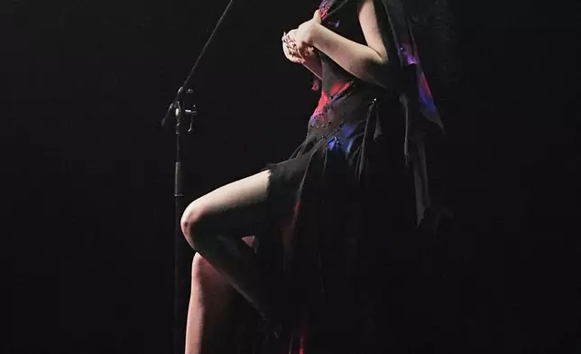 Zoe Me from Switzerland performs the song "Voyage" during the dress rehearsal for the Grand Final of the 69th Eurovision Song Contest, in Basel, Switzerland, Friday, May 16 2025. (AP Photo/Martin Meissner)