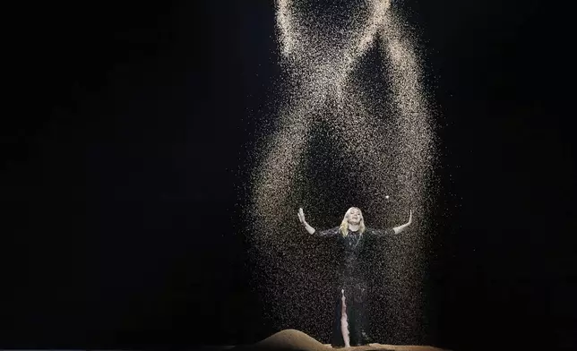 Louane from France performs the song "maman" during the second semi-final of the 69th Eurovision Song Contest, in Basel, Switzerland, Thursday, May 15, 2025. (AP Photo/Martin Meissner)