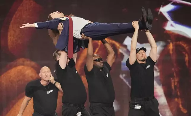 Tommy Cash from Estonia performs the song "Espresso Macchiato" during the dress rehearsal for the Grand Final of the 69th Eurovision Song Contest, in Basel, Switzerland, Friday, May 16 2025. (AP Photo/Martin Meissner)