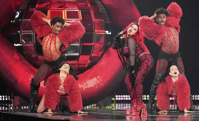 Miriana Conte from Malta performs the song "SERVING" during the dress rehearsal for the Grand Final of the 69th Eurovision Song Contest, in Basel, Switzerland, Friday, May 16 2025. (AP Photo/Martin Meissner)