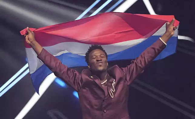 Claude from the Netherlands who will perform the song "C'est La Vie" is introduced to the crowd during the dress rehearsal for the Grand Final of the 69th Eurovision Song Contest, in Basel, Switzerland, Friday, May 16 2025. (AP Photo/Martin Meissner)