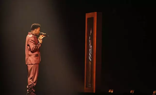 Claude from the Netherlands performs the song "C'est La Vie" during the first semi-final of the 69th Eurovision Song Contest, in Basel, Switzerland, Tuesday, May 13, 2025. (AP Photo/Martin Meissner)
