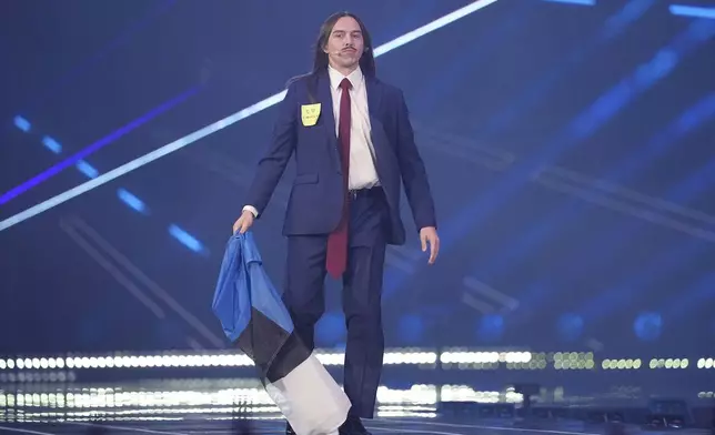 Tommy Cash from Estonia who will perform the song "Espresso Macchiato" on stage during the dress rehearsal for the Grand Final of the 69th Eurovision Song Contest, in Basel, Switzerland, Friday, May 16 2025. (AP Photo/Martin Meissner)
