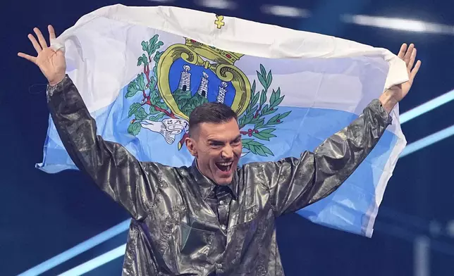 Gabry Ponte from San Marino who will perform the song "Tutta L'Italia" introduced to the crowd during the dress rehearsal for the Grand Final of the 69th Eurovision Song Contest, in Basel, Switzerland, Friday, May 16 2025. (AP Photo/Martin Meissner)