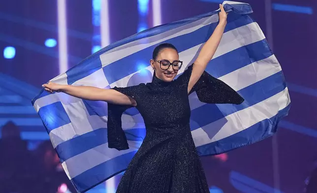 Klavdia from Greece who will perform the song "Asteromata" is introduced to the crowd during the dress rehearsal for the Grand Final of the 69th Eurovision Song Contest, in Basel, Switzerland, Friday, May 16 2025. (AP Photo/Martin Meissner)