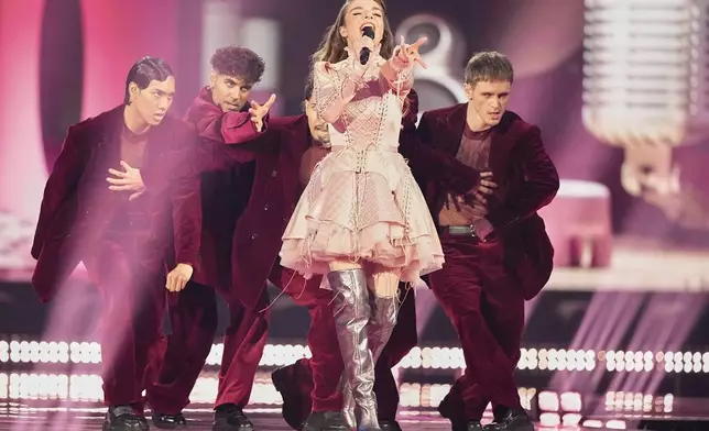 Laura Thorn from Luxembourg performs the song "La Poupee Monte Le Son" during the second semi-final of the 69th Eurovision Song Contest, in Basel, Switzerland, Thursday, May 15, 2025. (AP Photo/Martin Meissner)
