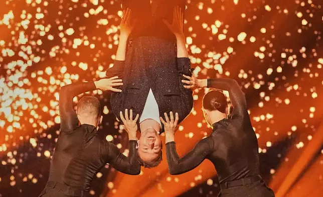 Klemen from Slovenia performs the song "How Much Time Do We Have Left" during the first semi-final of the 69th Eurovision Song Contest, in Basel, Switzerland, Tuesday, May 13, 2025. (AP Photo/Martin Meissner)