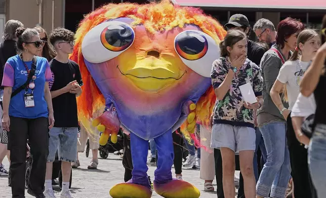 The Eurovision mascot Lumo walks at the Eurovision square during the 69th Eurovision Song Contest week in Basel, Switzerland, Friday May 16, 2025. (AP Photo/Martin Meissner)