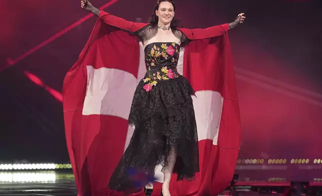 Zoe Me from Switzerland who will perform the song "Voyage" is introduced to the crowd during the dress rehearsal for the Grand Final of the 69th Eurovision Song Contest, in Basel, Switzerland, Friday, May 16 2025. (AP Photo/Martin Meissner)