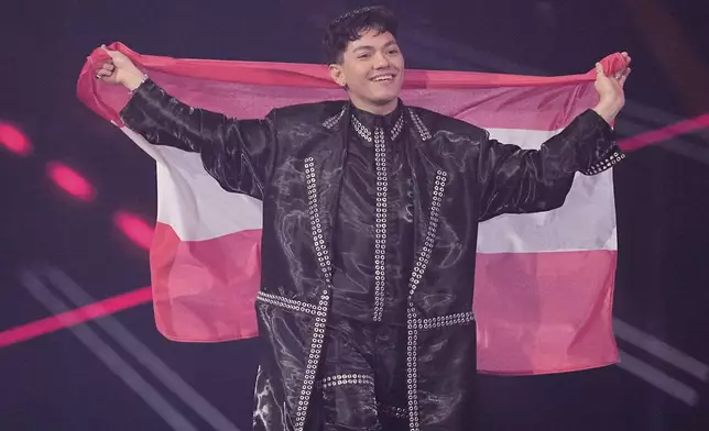 JJ from Austria who will perform the song "Wasted Love" on stage during the dress rehearsal for the Grand Final of the 69th Eurovision Song Contest, in Basel, Switzerland, Friday, May 16 2025. (AP Photo/Martin Meissner)