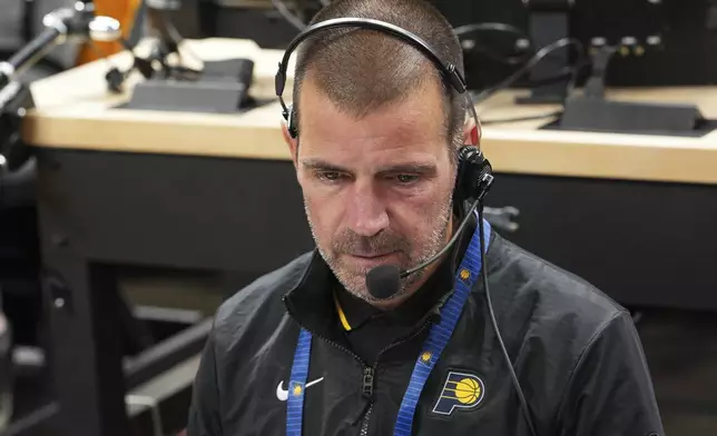 Dean Heaviland, vice president of game operations at Pacers Sports &amp; Entertainment, works before Game 3 of the Eastern Conference finals of the NBA basketball playoffs between the Indiana Pacers and the New York Knicks, Sunday, May 25, 2025, in Indianapolis. (AP Photo/AJ Mast)