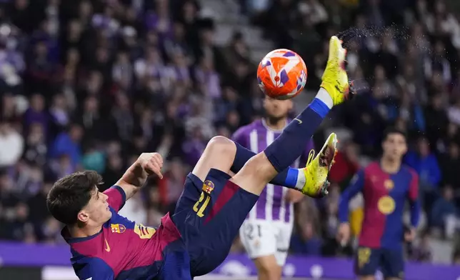 Barcelona's Pau Victor shoots the ball during the Spanish La Liga soccer match between Valladolid and FC Barcelona at the Jose Zorrilla stadium in Valladolid, Spain, Saturday, May 3, 2025. (AP Photo/Manu Fernandez)