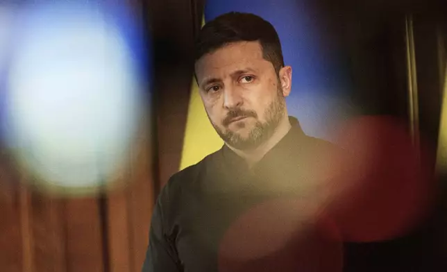 Ukrainian President Volodymyr Zelenskyy speaks to journalists during a news conference in Kyiv, Ukraine, Tuesday, May 13, 2025. (AP Photo/Evgeniy Maloletka)