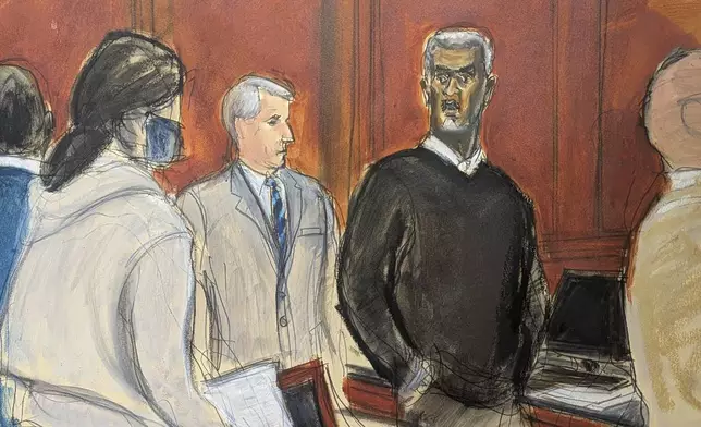 Sean 'Diddy' Combs, right, stands and looks at jurors as they file into the jury box at the start of jury selection at Manhattan federal court, Monday, May 5, 2025, in New York. (Elizabeth Williams via AP)