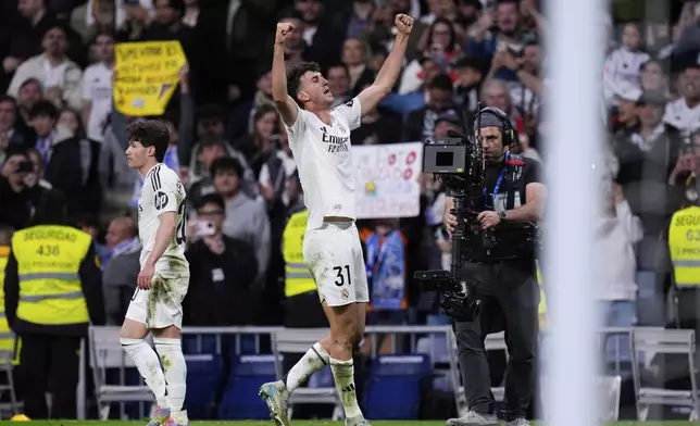 Real Madrid's Jacobo Ramon celebrates after scoring his side's second goal during a Spanish La Liga soccer match between Real Madrid and Mallorca in Madrid, Spain, Wednesday, May 14, 2025. (AP Photo/Manu Fernandez)