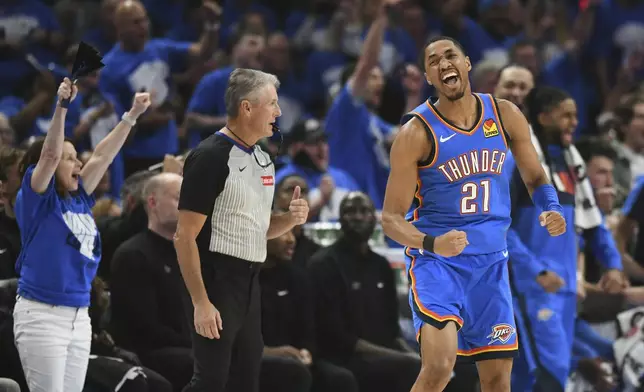 CORRECTS PLAYER'S TEAM AND NAME - Oklahoma City Thunder guard Aaron Wiggins (21) celebrates after sinking a basket in the first half of Game 7 in the Western Conference semifinals of the NBA basketball playoffs against the Denver Nuggets, Sunday, May 18, 2025, in Oklahoma City. (AP Photo/Kyle Phillips)