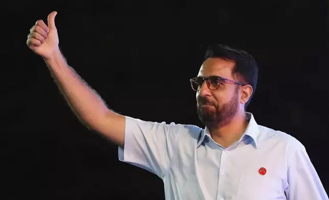 Singapore opposition leader and Workers' Party (WP) Secretary-General, Pritam Singh greets supporters at the assembly centre during the general election in Singapore, Saturday, May 3, 2025. (AP Photo/Suhaimi Abdullah)