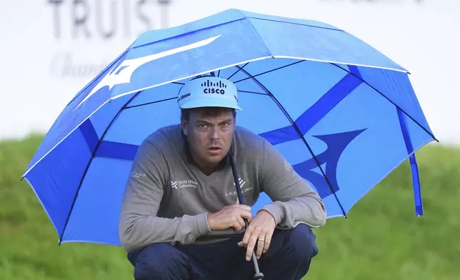 Keith Mitchell waits on the 17th hole during the second round of the Truist Championship golf tournament at the Philadelphia Cricket Club, Friday, May 9, 2025, in Flourtown. (AP Photo/Matt Rourke)