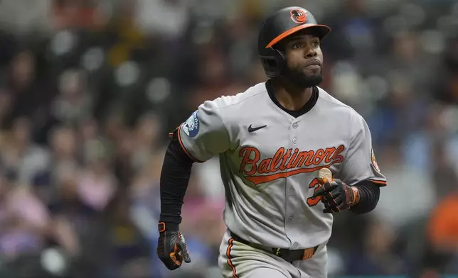 Baltimore Orioles' Cedric Mullins rounds the bases after hitting a three-run home run during the seventh inning of a baseball game against the Milwaukee Brewers, Monday, May 19, 2025, in Milwaukee. (AP Photo/Aaron Gash)