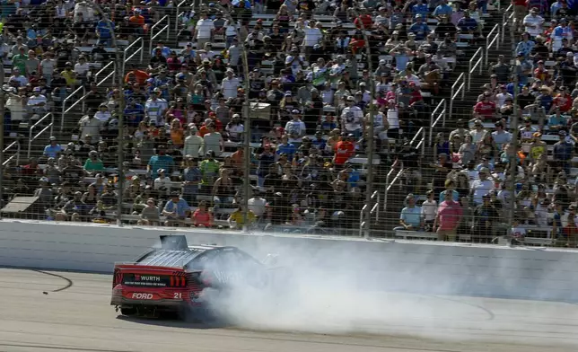 Josh Berry crashes while coming out of Turn 4 during a NASCAR Cup Series auto race at Texas Motor Speedway in Fort Worth, Texas, Sunday, May 4, 2025. (AP Photo/Randy Holt)