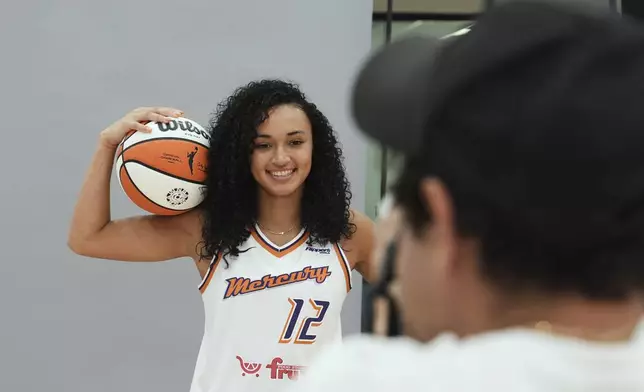 Phoenix Mercury guard Celeste Taylor poses for a photo during Mercury Media Day at the team's WNBA basketball training facility, Wednesday, April 30, 2025, in Phoenix. (AP Photo/Ross D. Franklin)
