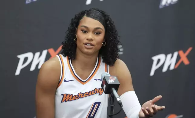 Phoenix Mercury forward Satou Sabally answers a quesion during Mercury Media Day at the team's WNBA basketball training facility Wednesday, April 30, 2025, in Phoenix. (AP Photo/Ross D. Franklin)