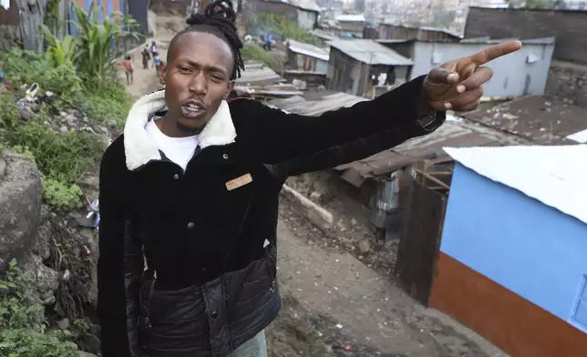 Joseph Kariaga who once lived the "gangster life" speaks during an interview with the associated press in the Mathare informal settlement of the capital Nairobi, Kenya Saturday, April 5, 2025. (AP Photo/Andrew Kasuku)