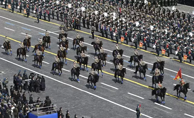 Russian military troops attend the Victory Day military parade in Moscow, Russia, Friday, May 9, 2025, during celebrations of the 80th anniversary of the Soviet Union's victory over Nazi Germany during the World War II. (Maxim Bogodvid/Photo host agency RIA Novosti via AP)
