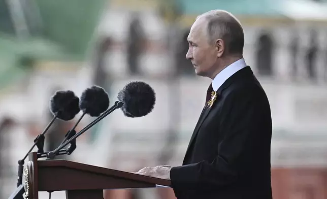 Russian President Vladimir Putin speaks during the Victory Day military parade in Moscow, Russia, Friday, May 9, 2025, during celebrations of the 80th anniversary of the Soviet Union's victory over Nazi Germany during the World War II. (Ilya Pitalev/Photo host agency RIA Novosti via AP)