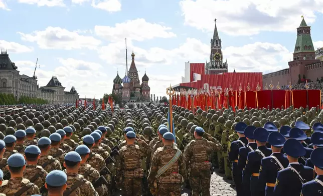 Russian servicemen attend the Victory Day military parade in Moscow, Russia, Friday, May 9, 2025, during celebrations of the 80th anniversary of the Soviet Union's victory over Nazi Germany during the World War II. (Pelagia Tikhonova/Photo host agency RIA Novosti via AP)