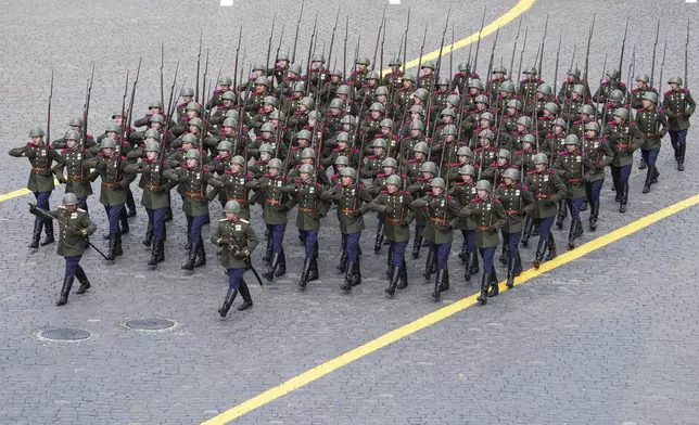 Russian servicemen attend the Victory Day military parade in Moscow, Russia, Friday, May 9, 2025, during celebrations of the 80th anniversary of the Soviet Union's victory over Nazi Germany during the World War II. (Alexander Wilf/Photo host agency RIA Novosti via AP)