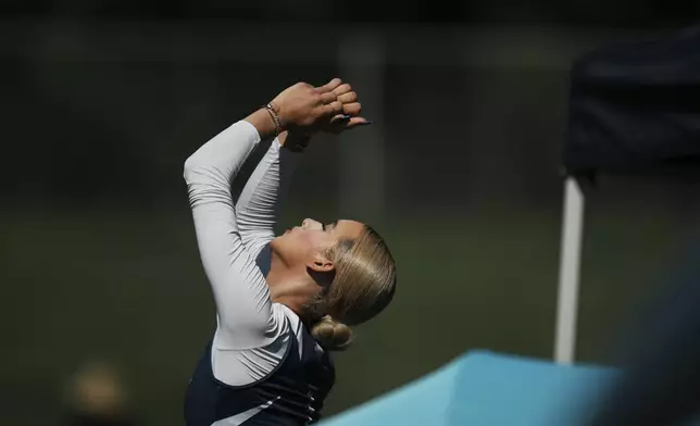 AB Hernandez warms up before competing in the high jump at the California high school track-and-field championships in Clovis, Calif., Friday, May 30, 2025. (AP Photo/Jae C. Hong)
