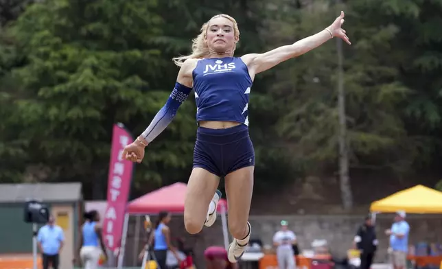 AB Hernandez of Jurupa Valley competes in the girls long jump during the CIF Southern Section Masters Meet at Moorpark High School, Saturday, May 24, 2025, in Moorpark, Calif. (Kirby Lee via AP)