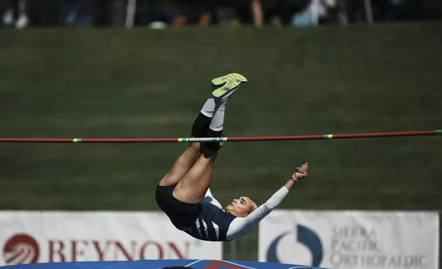 AB Hernandez competes in the high jump at the California high school track-and-field championships in Clovis, Calif., Friday, May 30, 2025. (AP Photo/Jae C. Hong)