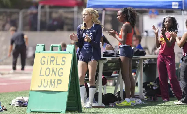 AB Hernandez of Jurupa Valley waits to compete in the girls long jump during the CIF Southern Section Masters Meet at Moorpark High School, Saturday, May 24, 2025, in Moorpark, Calif. (Kirby Lee via AP)
