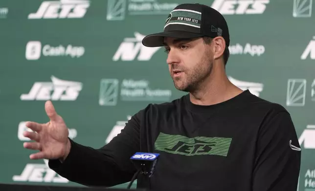 New York Jets offensive coordinator Tanner Engstrand speaks with reporters before an NFL football practice in Florham Park, N.J., Thursday, May 29, 2025. (AP Photo/Seth Wenig)