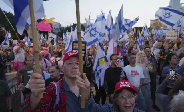 People take part in a protest demanding the end of the war and immediate release of hostages held by Hamas in the Gaza Strip, and against Prime Minister Benjamin Netanyahu's government in Tel Aviv, Israel, Saturday, May 3, 2025.(AP Photo/Ariel Schalit)