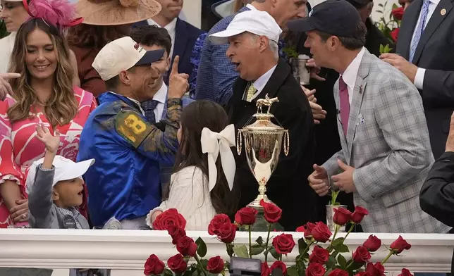 Jockey Junior Alvarado celebrates after riding Sovereignty to victory in the 151st running of the Kentucky Derby horse race at Churchill Downs Saturday, May 3, 2025, in Louisville, Ky. (AP Photo/Abbie Parr)