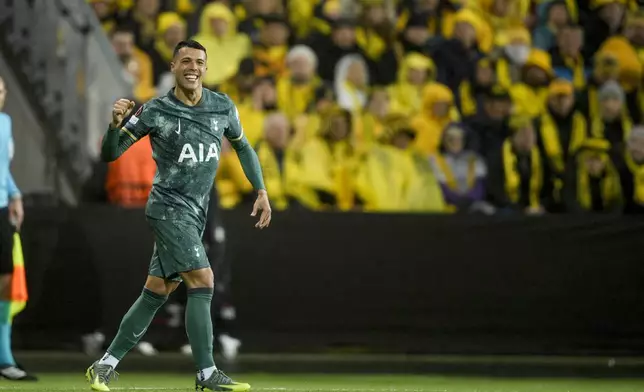 Tottenham's Pedro Porro celebrates scoring a goal during the Europa League semifinal soccer match between Bodø/Glimt and Tottenham Hotsour at Aspmyra Stadium, Bodo, Norway, Thursday May 8, 2025. (Stian Lysberg Solum/NTB via AP)